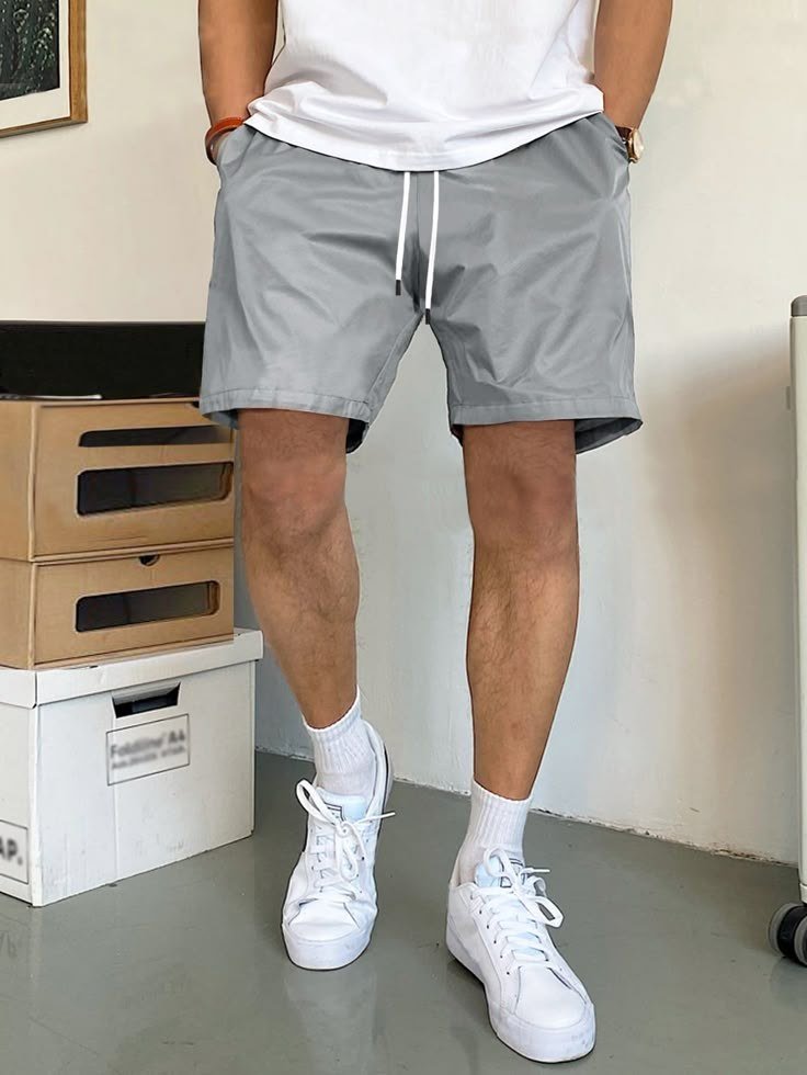 Loose Fit Men_s Shorts With Slant Pockets And Drawstring Waist